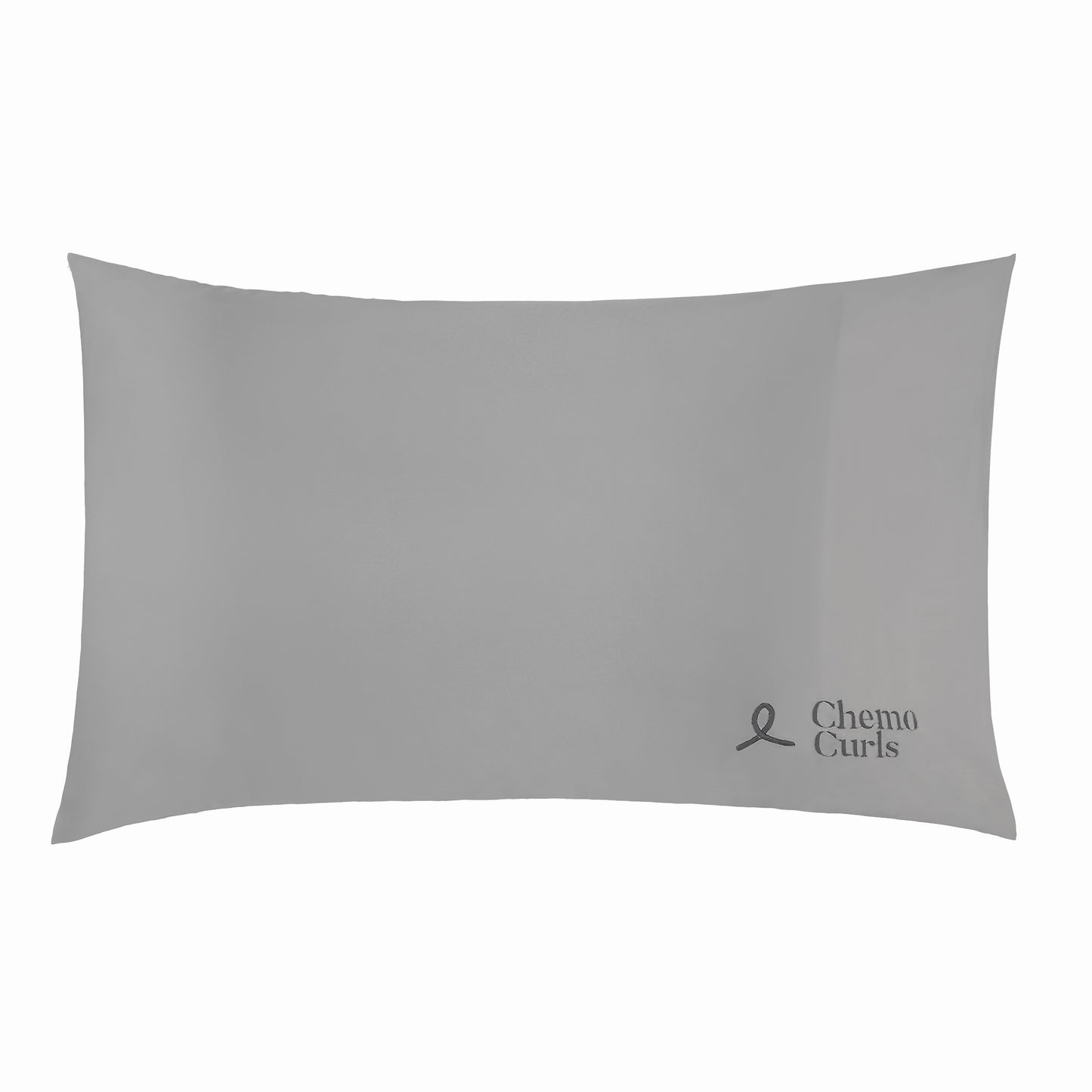 An image of a grey satin pillowcase with a sleek and smooth surface. The soft grey color of the pillowcase exudes elegance and sophistication. The Chemo Curls logo is skillfully embroidered in black thread on the lower left corner, adding a personalized touch. The satin fabric catches the light, creating a subtle sheen and highlighting the luxurious texture. This image portrays a sense of comfort, style, and attention to detail.